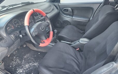 Mazda 323, 1995 год, 235 000 рублей, 11 фотография