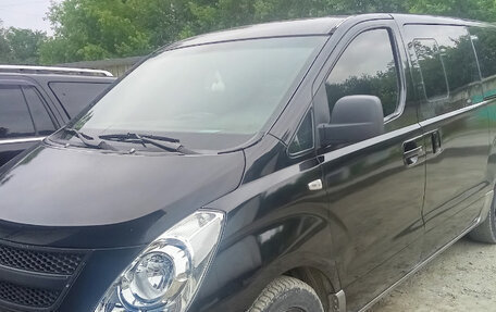 Hyundai Grand Starex Grand Starex I рестайлинг 2, 2008 год, 1 050 000 рублей, 2 фотография