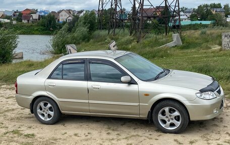 Mazda 323, 2002 год, 450 000 рублей, 23 фотография