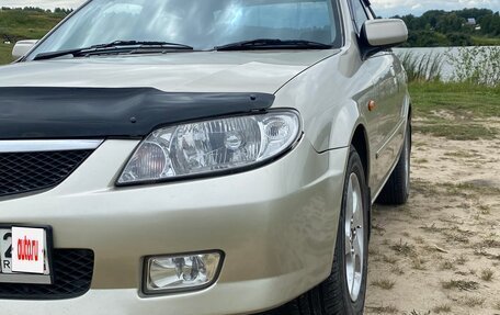 Mazda 323, 2002 год, 450 000 рублей, 24 фотография