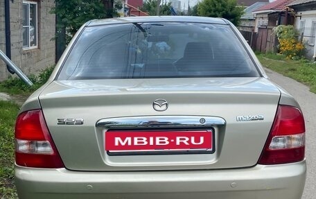 Mazda 323, 2002 год, 450 000 рублей, 19 фотография