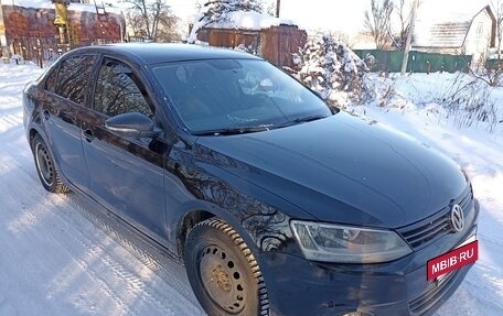 Volkswagen Jetta VI, 2014 год, 900 000 рублей, 2 фотография