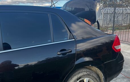 Nissan Tiida, 2011 год, 590 000 рублей, 10 фотография