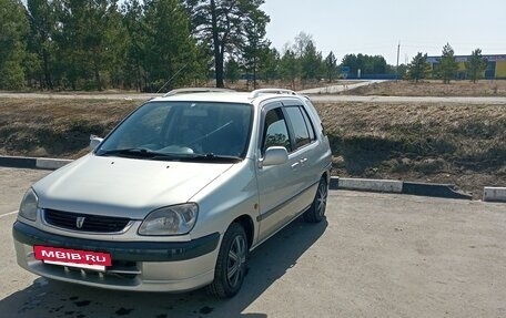 Toyota Raum I, 2000 год, 450 000 рублей, 2 фотография