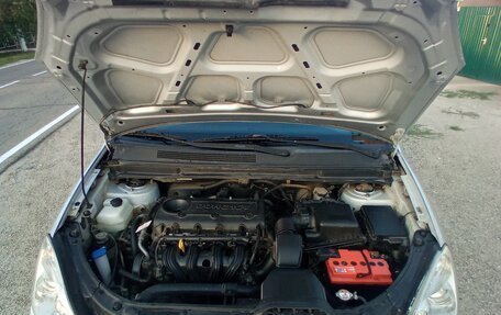 KIA Carens III (RP), 2010 год, 750 000 рублей, 9 фотография