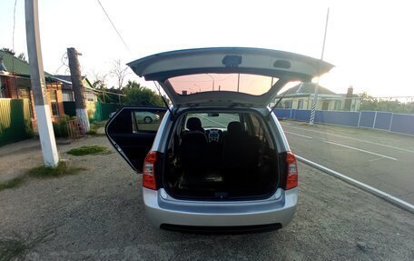 KIA Carens III (RP), 2010 год, 750 000 рублей, 11 фотография