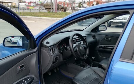 KIA Rio II, 2011 год, 569 000 рублей, 11 фотография