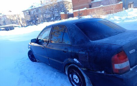 Mazda Protege, 2001 год, 115 000 рублей, 3 фотография