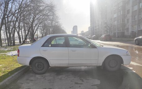 Mazda Familia, 1999 год, 250 000 рублей, 3 фотография