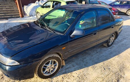 Mitsubishi Carisma I, 1998 год, 115 000 рублей, 3 фотография