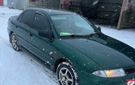 Mitsubishi Carisma I, 1997 год, 130 000 рублей, 3 фотография