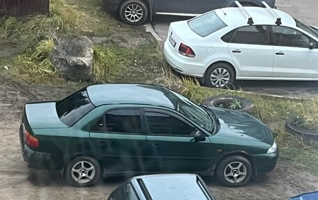 Mitsubishi Carisma I, 1997 год, 130 000 рублей, 8 фотография