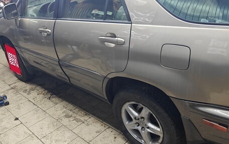 Lexus RX IV рестайлинг, 1998 год, 600 000 рублей, 7 фотография