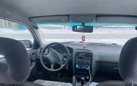 Toyota Avensis III рестайлинг, 1998 год, 220 000 рублей, 8 фотография