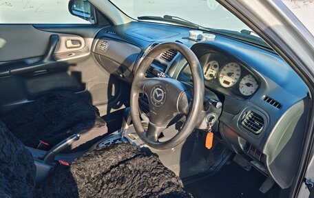 Mazda Familia, 2000 год, 460 000 рублей, 17 фотография