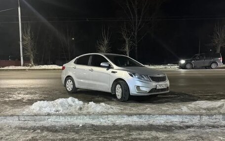 KIA Rio III рестайлинг, 2011 год, 750 000 рублей, 19 фотография