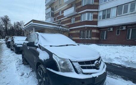Cadillac SRX II рестайлинг, 2011 год, 770 000 рублей, 2 фотография