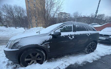 Cadillac SRX II рестайлинг, 2011 год, 770 000 рублей, 3 фотография