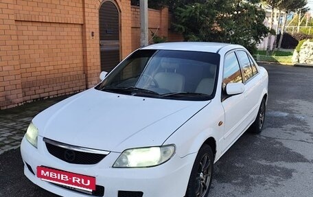 Mazda Familia, 2003 год, 335 000 рублей, 7 фотография