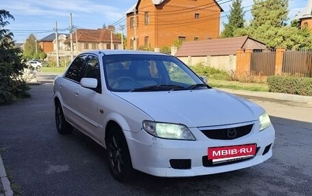 Mazda Familia, 2003 год, 335 000 рублей, 14 фотография