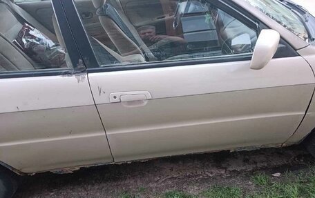 Mitsubishi Mirage VI рестайлинг, 1999 год, 100 000 рублей, 10 фотография