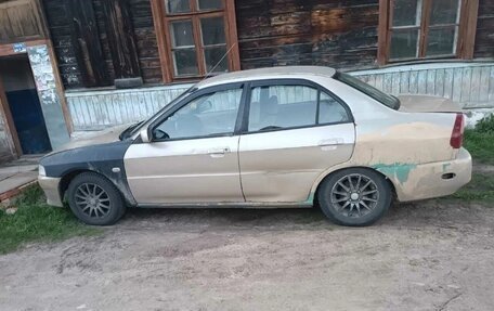 Mitsubishi Mirage VI рестайлинг, 1999 год, 100 000 рублей, 13 фотография