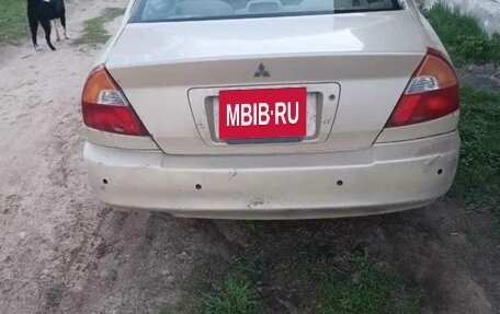 Mitsubishi Mirage VI рестайлинг, 1999 год, 100 000 рублей, 12 фотография