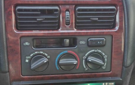 Toyota Avensis III рестайлинг, 1999 год, 220 000 рублей, 14 фотография