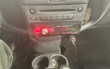 Toyota Yaris I рестайлинг, 2001 год, 449 000 рублей, 12 фотография