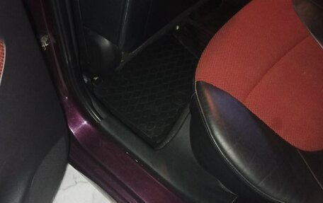 Hyundai Solaris II рестайлинг, 2011 год, 800 000 рублей, 23 фотография