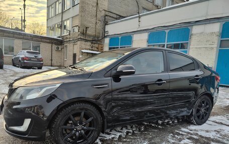 KIA Rio III рестайлинг, 2013 год, 790 000 рублей, 24 фотография