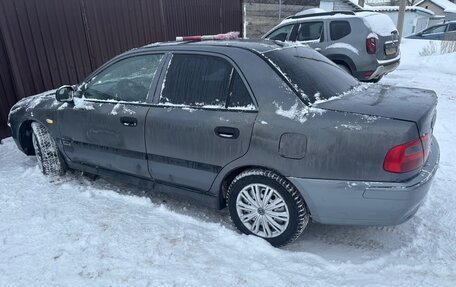 Mitsubishi Carisma I, 2003 год, 200 000 рублей, 1 фотография