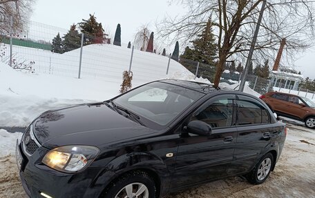 KIA Rio II, 2011 год, 550 000 рублей, 10 фотография