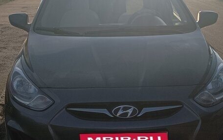 Hyundai Solaris II рестайлинг, 2011 год, 630 000 рублей, 11 фотография