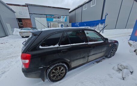 Mazda 323, 1999 год, 230 000 рублей, 4 фотография