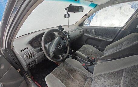Mazda 323, 1999 год, 230 000 рублей, 8 фотография