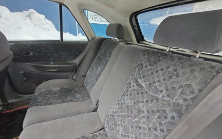 Mazda 323, 1999 год, 230 000 рублей, 10 фотография