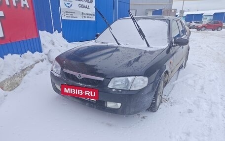 Mazda 323, 1999 год, 230 000 рублей, 7 фотография