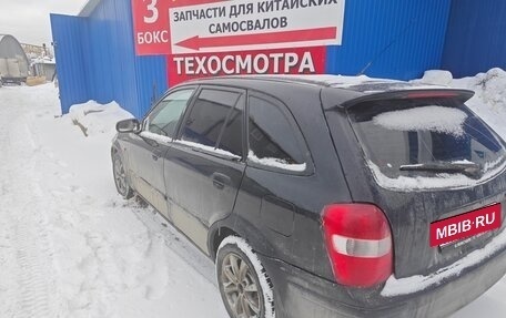 Mazda 323, 1999 год, 230 000 рублей, 6 фотография