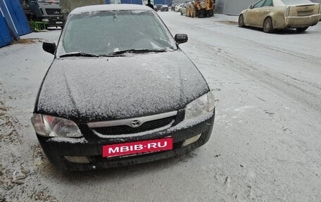 Mazda 323, 1999 год, 230 000 рублей, 17 фотография