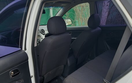 KIA Carens III (RP), 2010 год, 590 000 рублей, 11 фотография