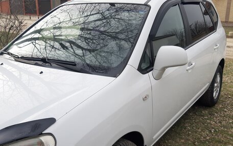 KIA Carens III (RP), 2010 год, 590 000 рублей, 4 фотография