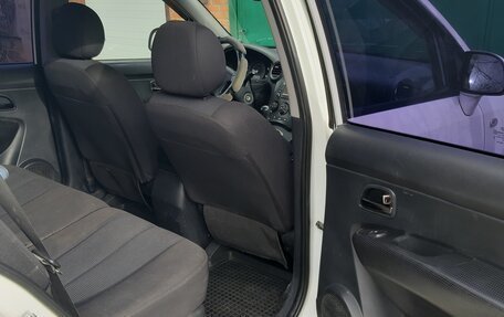 KIA Carens III (RP), 2010 год, 590 000 рублей, 9 фотография