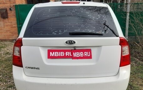 KIA Carens III (RP), 2010 год, 590 000 рублей, 7 фотография