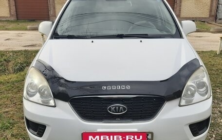 KIA Carens III (RP), 2010 год, 590 000 рублей, 2 фотография