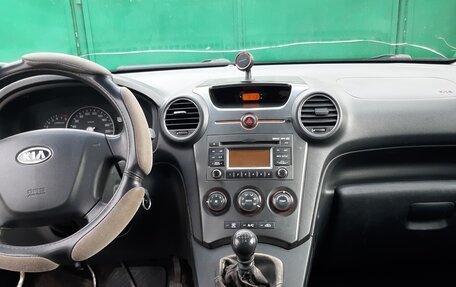 KIA Carens III (RP), 2010 год, 590 000 рублей, 16 фотография