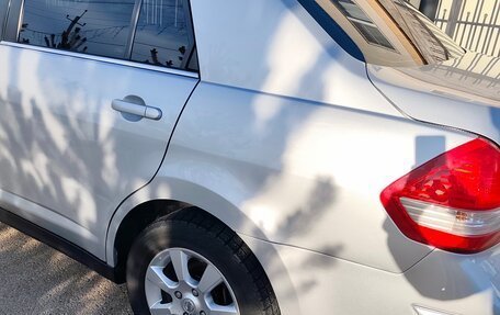 Nissan Tiida, 2010 год, 890 000 рублей, 6 фотография