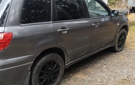 Mitsubishi Outlander III рестайлинг 3, 2007 год, 620 000 рублей, 2 фотография