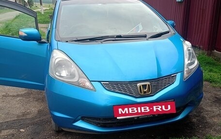 Honda Fit III, 2009 год, 750 000 рублей, 17 фотография