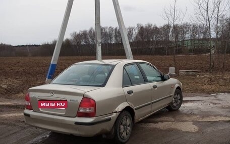 Mazda 323, 1998 год, 125 000 рублей, 3 фотография